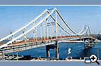 Park pedestrian bridge across the river of Dnieper, city Kiev